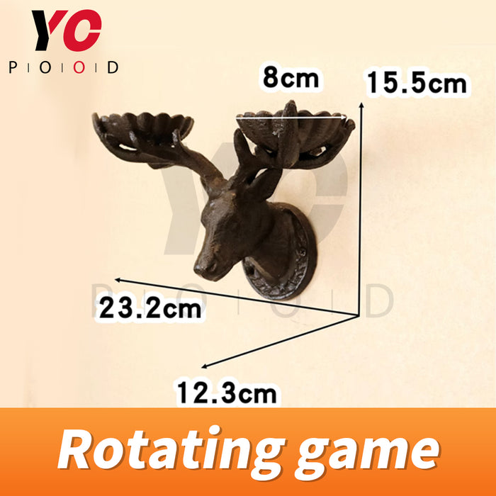 Rotating game with deer head
