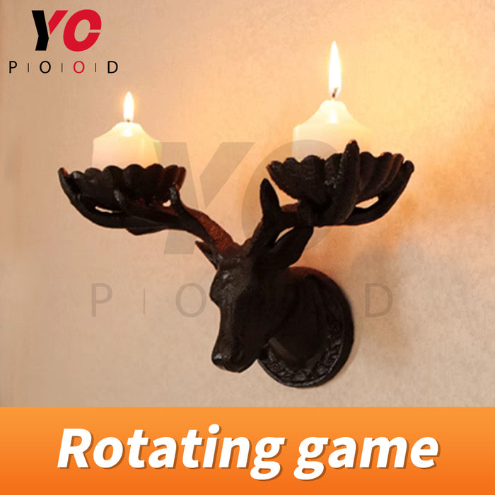 Rotating game with deer head